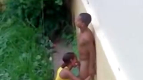 I walked out on balcony and saw one naked guy hugging his petite Latina girl right in the garden over my house. Girl got on her knees and gave her boy