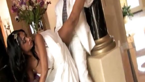 Beautiful dark skinned bride in wedding dress has her first night with her new husband and gets passionately fucked in all kind of positions.